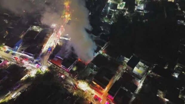 German national dies after returning to burning pension house