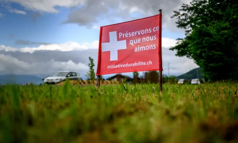 Swiss divided as population cap vote nears