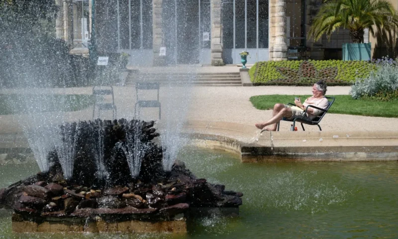 France swelters under record May temperatures as heatwave continues
