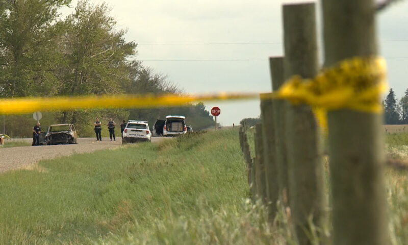 Judge reduces charges for two men accused in fatal roadside shooting near Calgary