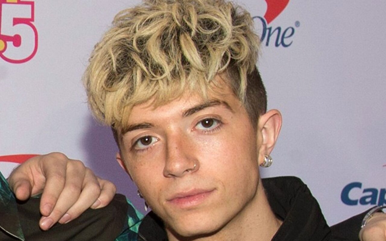Ex-girlfriend of boyband singer charged in alleged murder-for-hire plot