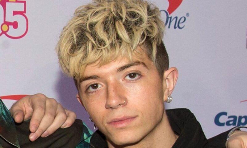 Ex-girlfriend of boyband singer charged in alleged murder-for-hire plot