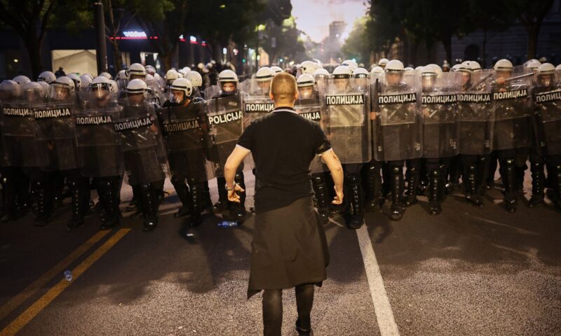 Riot police clash with protesters in Serbia after anti-government rally