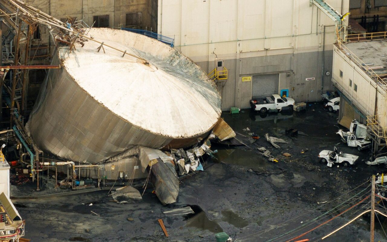 One killed and nine missing after chemical tank implodes in US