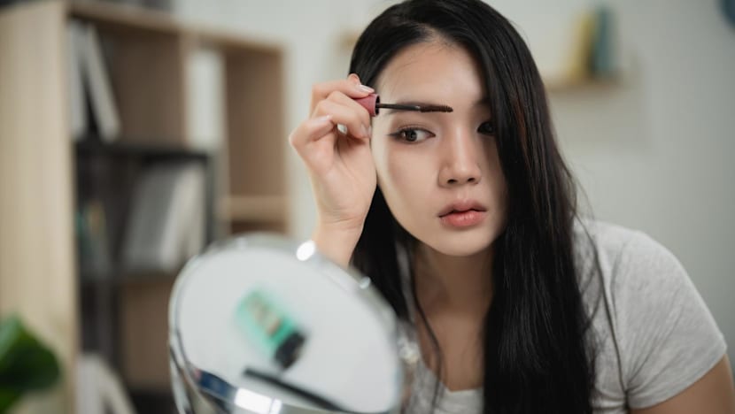 I tell my son he is perfect as he is – so what does he see when he looks at my bleached-blonde hair and makeup?