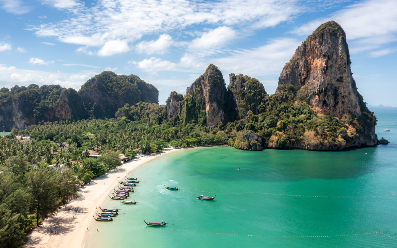 ‘I took a 50% pay cut to move to paradise – I’ve never been happier and I have money to spare’