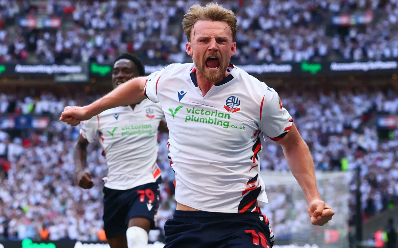 Bolton 4 Stockport 1: Trotters seal stunning return to Championship after seven-year absence with Wembley thumping