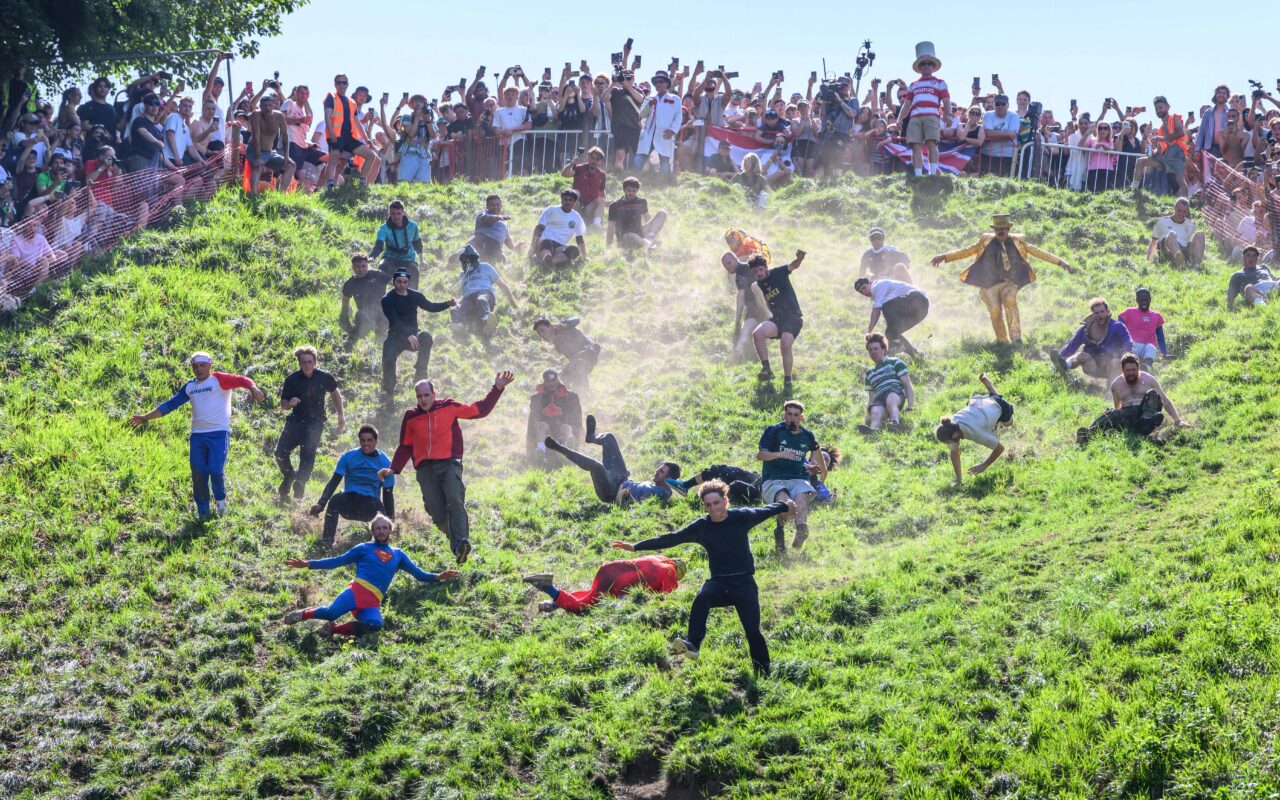 Meet the champion cheese rollers risking bumps, bruises & broken bones to keep bonkers British tradition alive