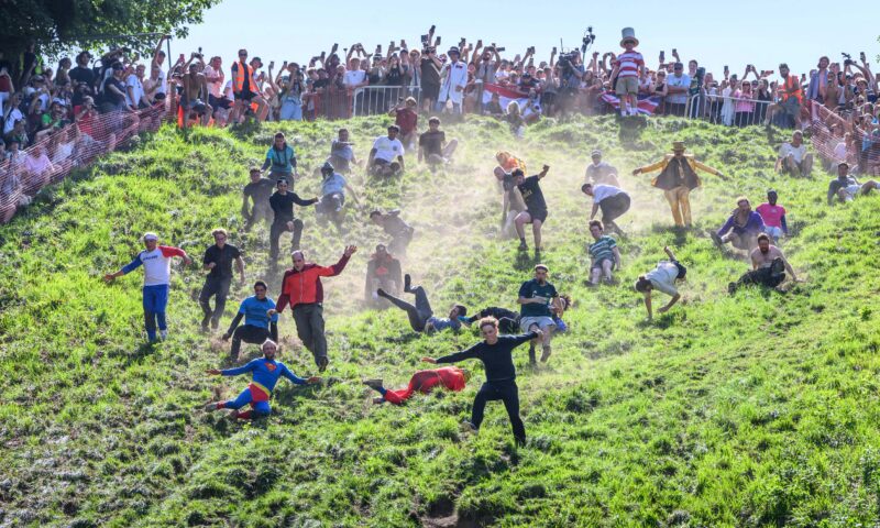 Meet the champion cheese rollers risking bumps, bruises & broken bones to keep bonkers British tradition alive