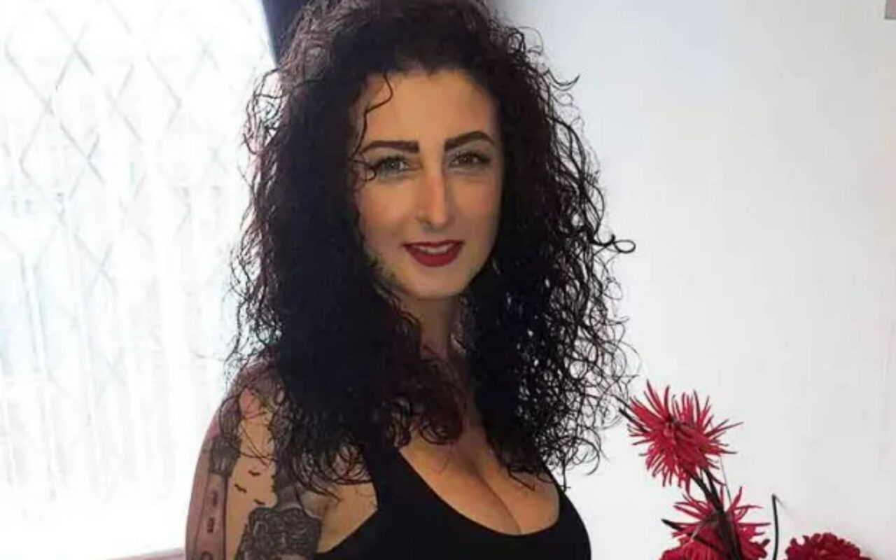 Woman, 44, found dead on estate is pictured as heartbroken family pay tribute after murder probe launched