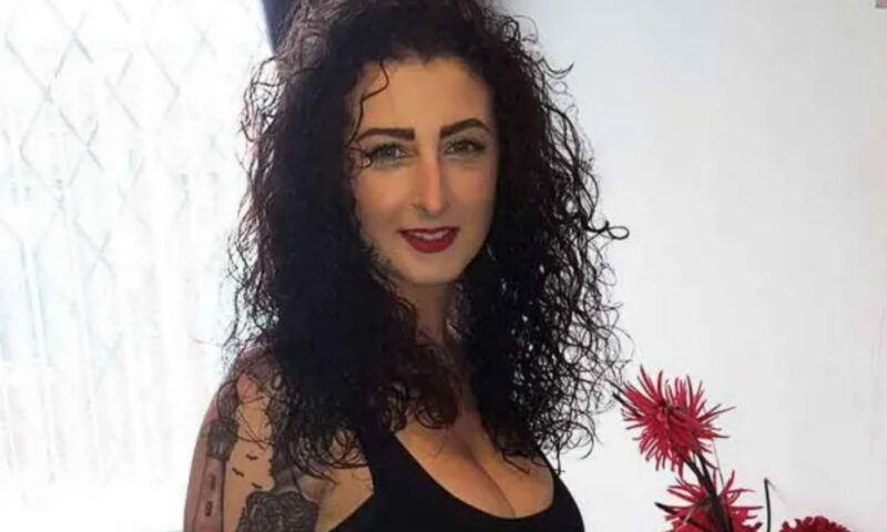 Woman, 44, found dead on estate is pictured as heartbroken family pay tribute after murder probe launched