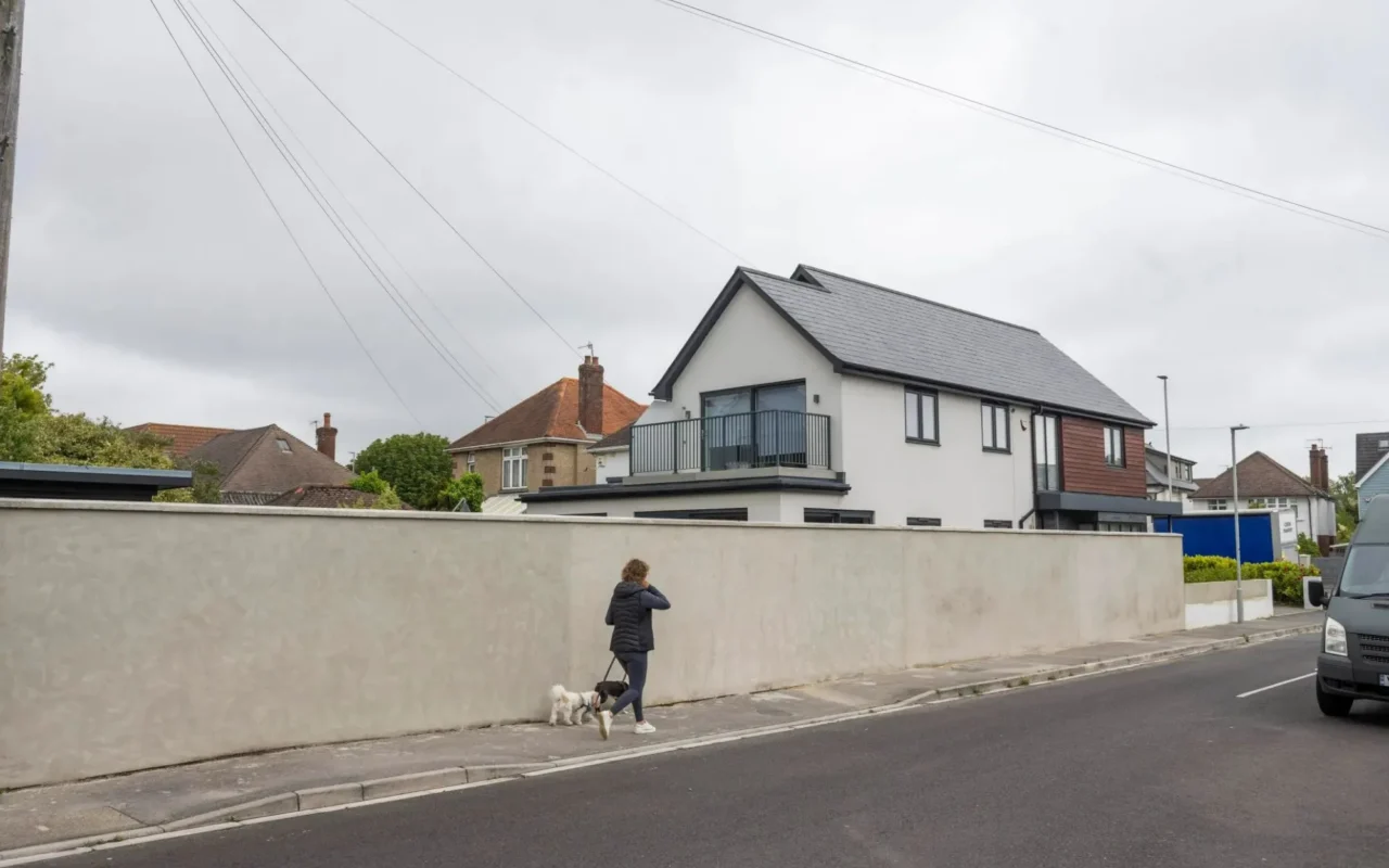 Our neighbour build a massive 7ft concrete ‘Berlin Wall’ outside his £1 million home – it’s horrible to look at