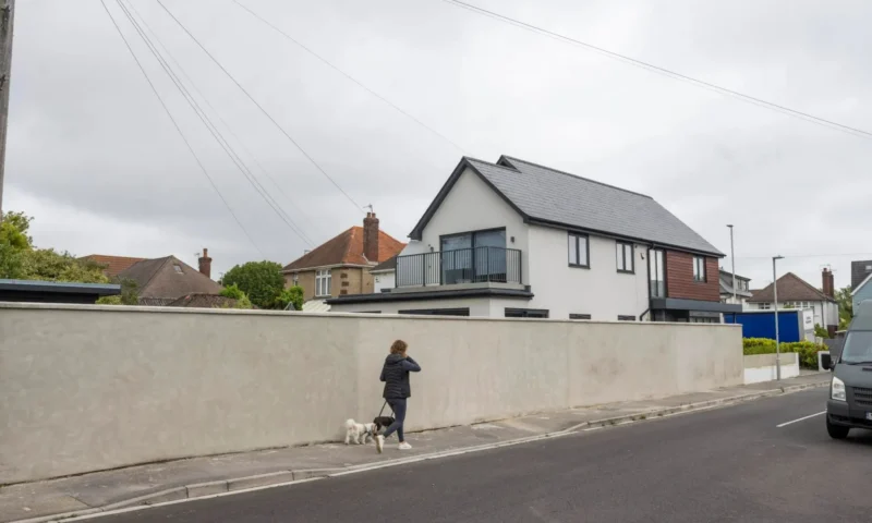 Our neighbour build a massive 7ft concrete ‘Berlin Wall’ outside his £1 million home – it’s horrible to look at