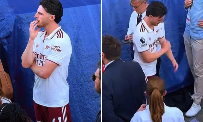 Declan Rice visibly upset as Arsenal star steps away from title celebrations to watch West Ham’s relegation