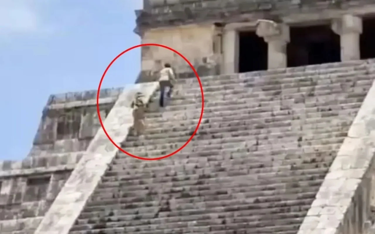 Shocking moment tourists brazenly scale iconic ancient pyramid before being arrested & face huge fine