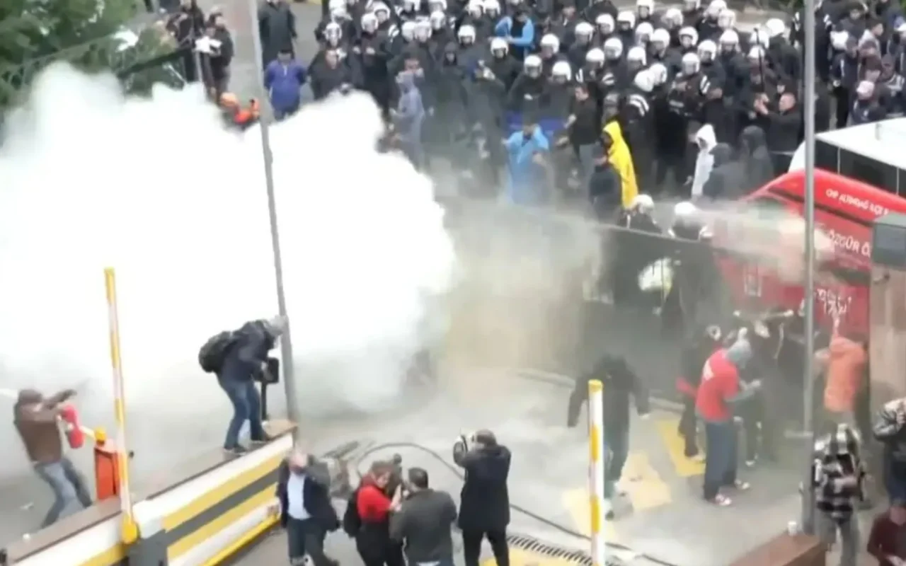 Moment riot police storm opposition party offices with tear gas as Turkish politicians barricade themselves inside