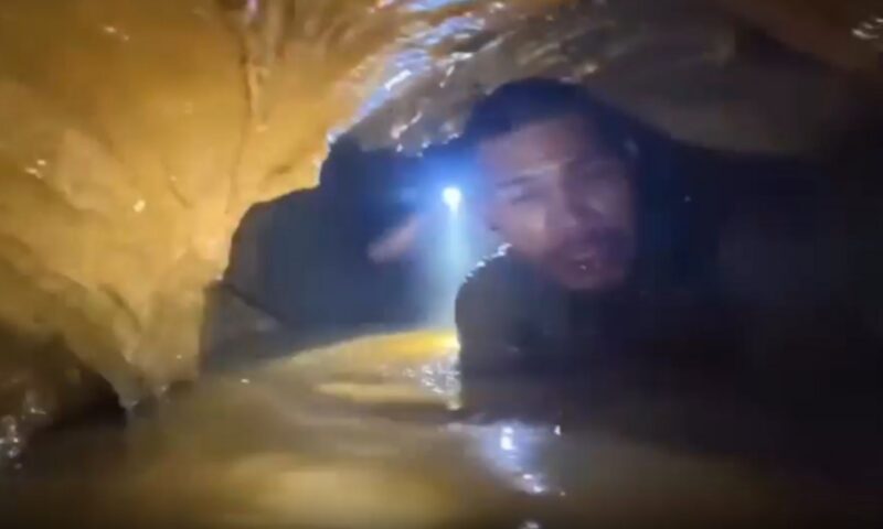 Nightmarish vids shows suffocatingly tight & flooded passages rescuers are crossing to reach seven stranded in Laos cave