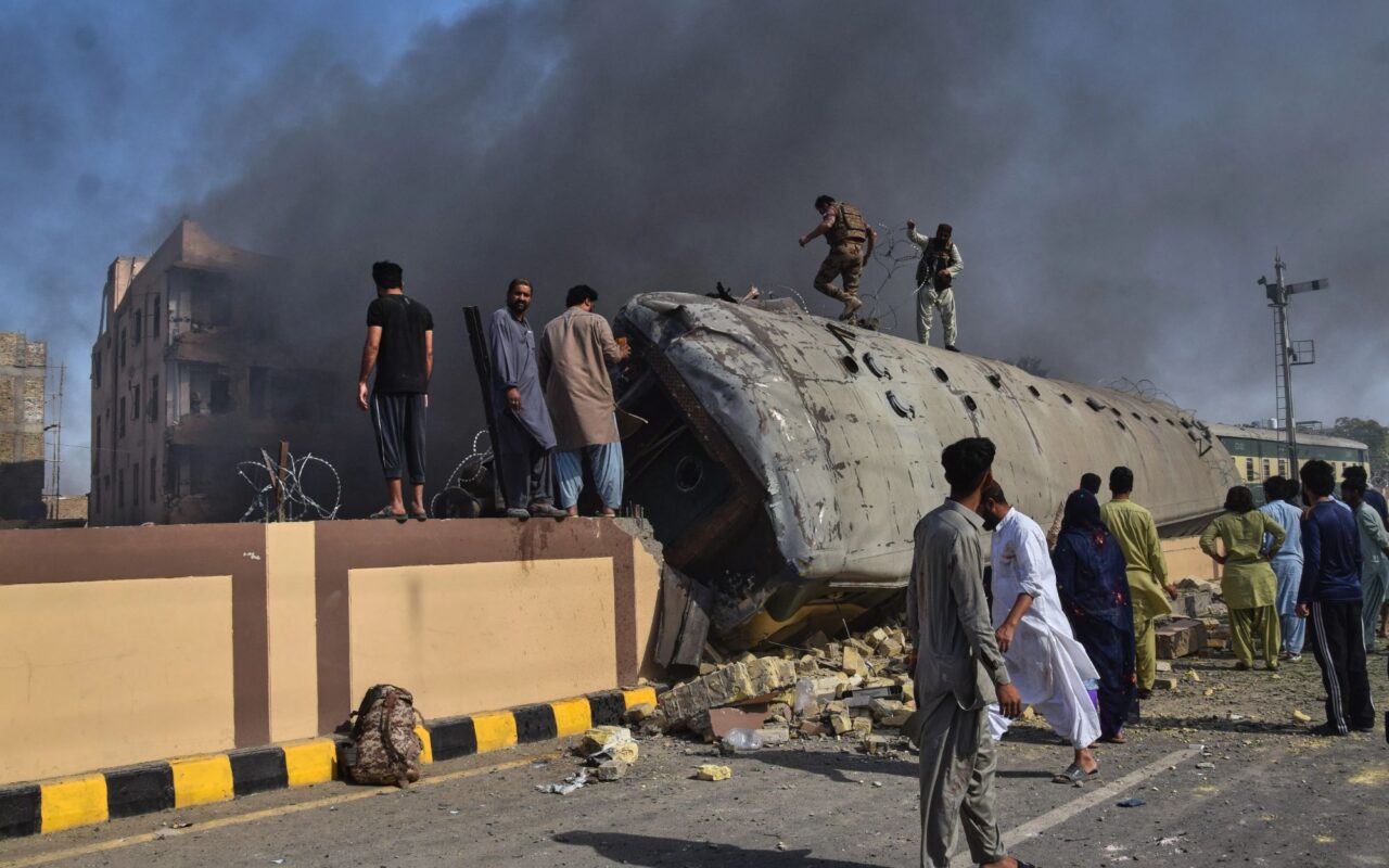 At least 24 killed in Pakistan train bombing as carriages carrying military staff overturned in fireball explosion
