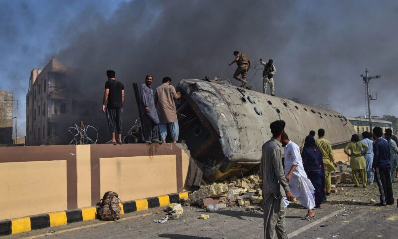 At least 24 killed in Pakistan train bombing as carriages carrying military staff overturned in fireball explosion