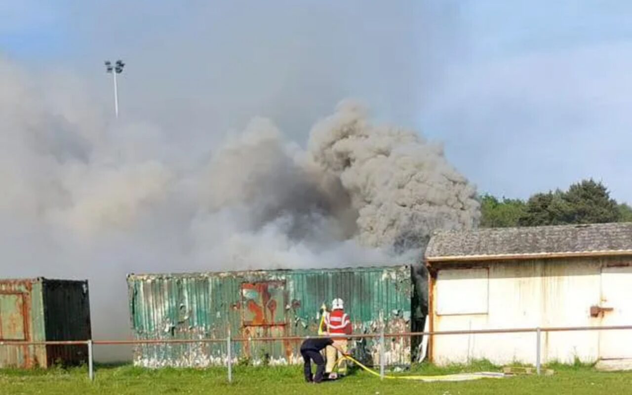 Boy, 11, trapped inside burning storage container at sport club rushed to hospital as teen arrested for attempted murder