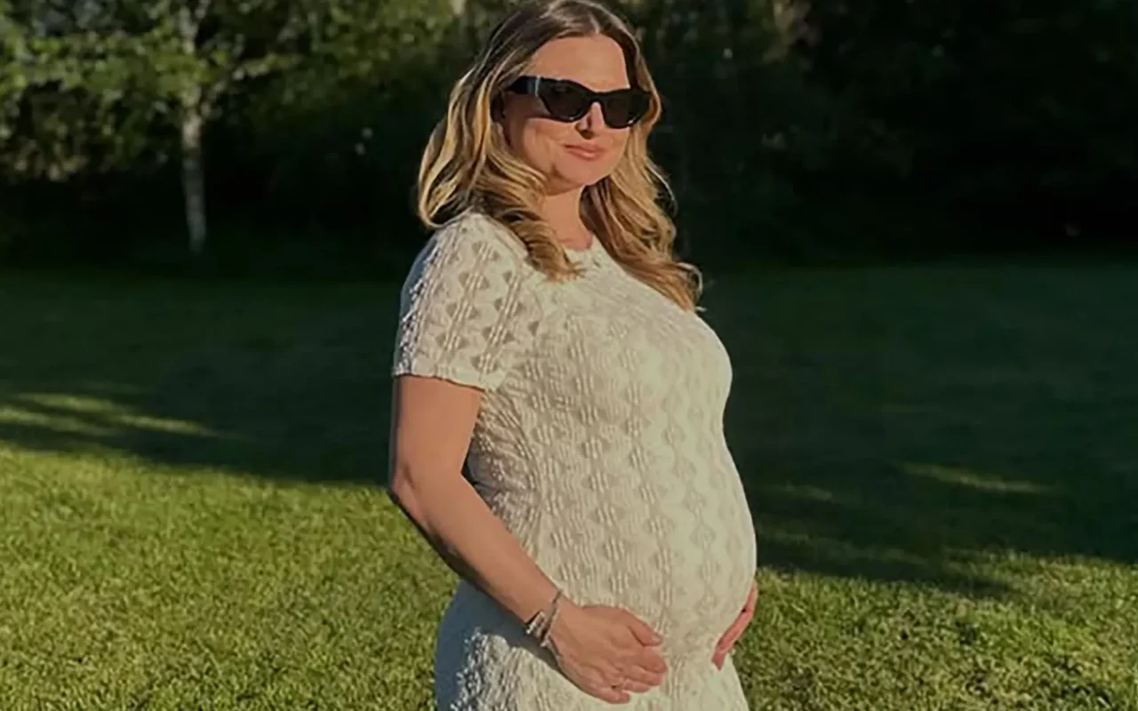 Love Island star Zara Holland reveals she’s pregnant with her first child as she shares photo of growing baby bump