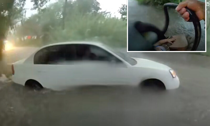Cop plucks baby from car overtaken by Texas floodwaters in dramatic bodycam clip: ‘I’m going in’