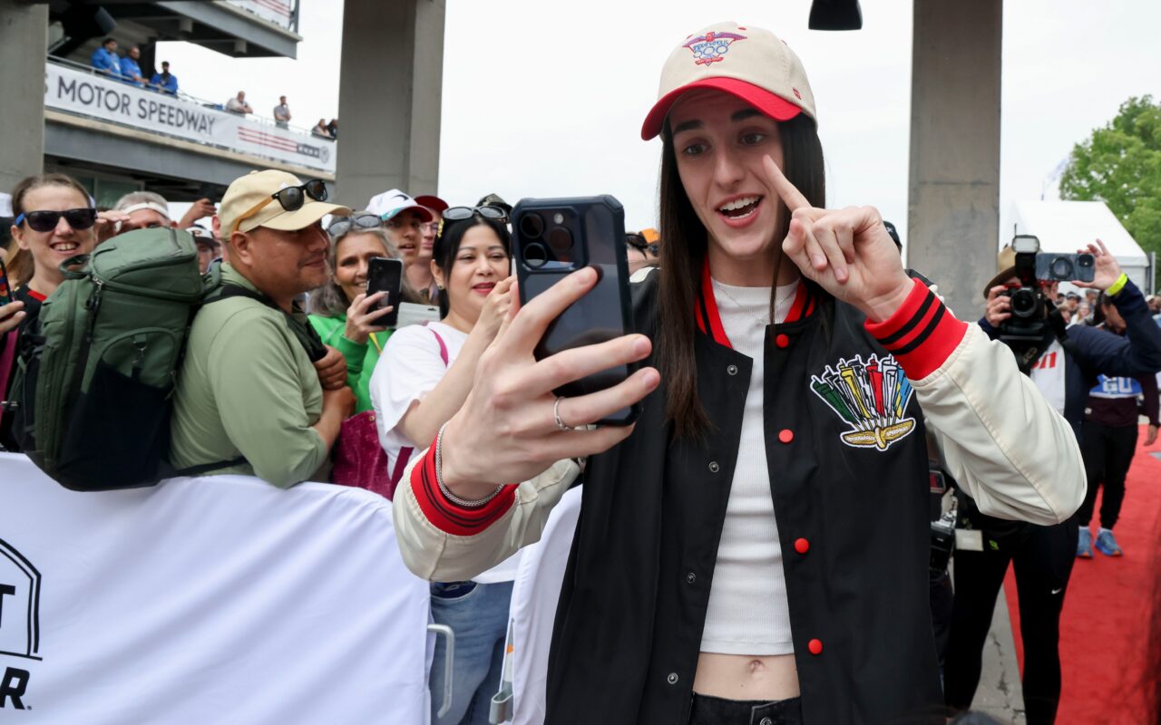 Caitlin Clark rocks custom helmet, get raucous ovation as Indy 500 Grand Marshal