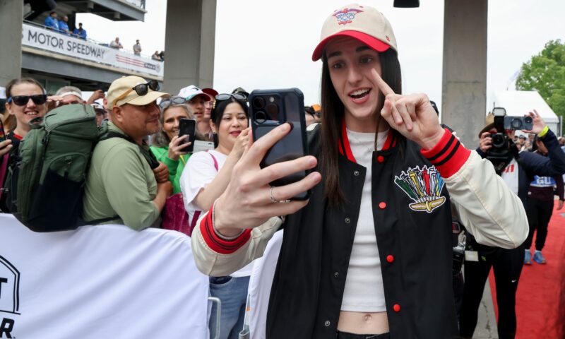Caitlin Clark rocks custom helmet, get raucous ovation as Indy 500 Grand Marshal