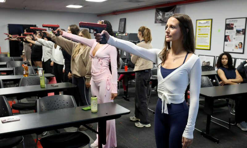 I took the first-of-its-kind ‘Pistols and Pilates’ class — and it left me sweating bullets