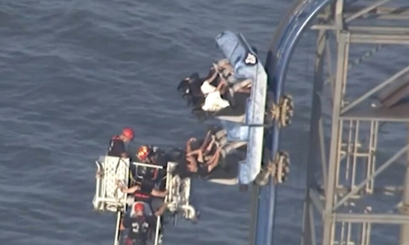 Students rescued from Texas roller coaster after hours dangling from 100-foot drop