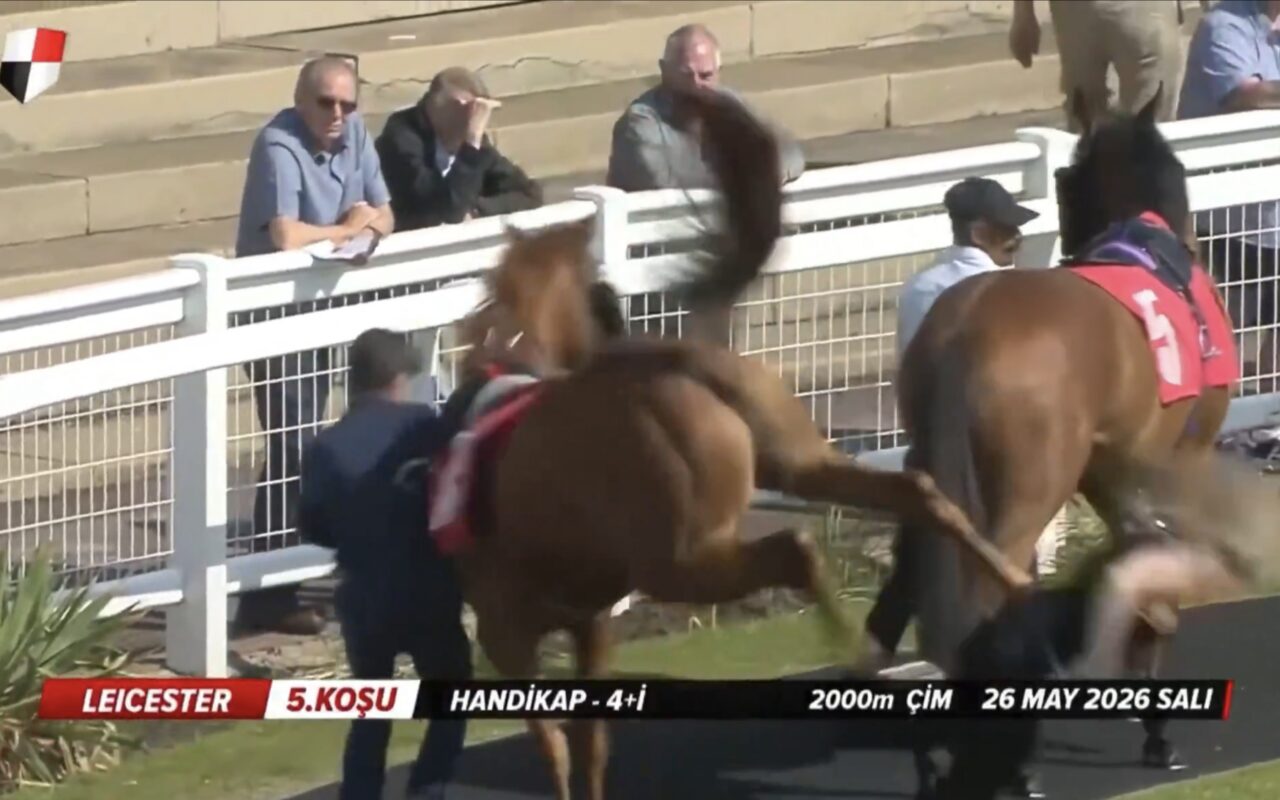 Trainer Richard Fahey’s assistant gets brutally bucked by racehorse — and sent flying over the track wall
