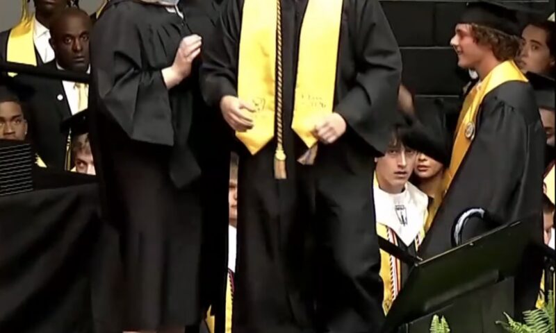 Texas teen Austin Metcalf’s twin brother accepts posthumous diploma at graduation — year after deadly track meet stabbing