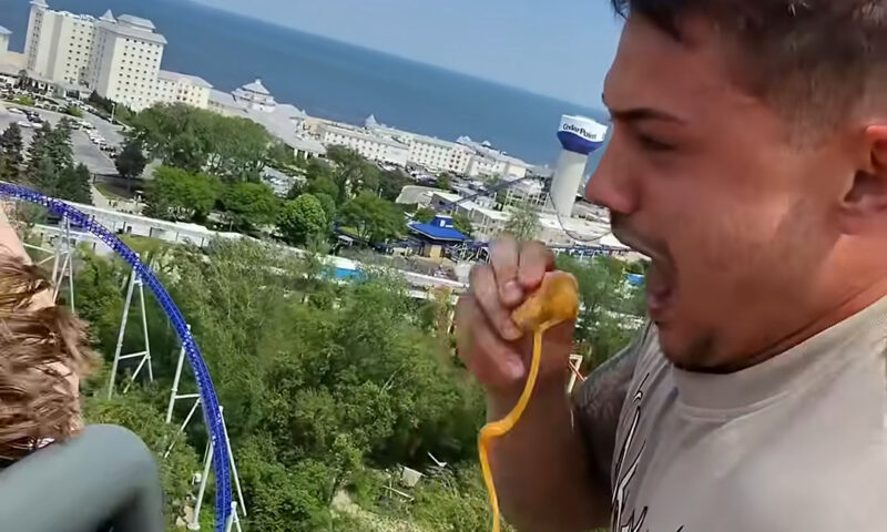 Six Flags bans Cedar Point parkgoer for life after he ate chicken nuggets on roller coaster in viral video