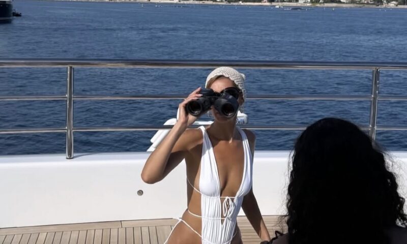 Bella Hadid’s skimpy swimsuit is completely open on the back and sides