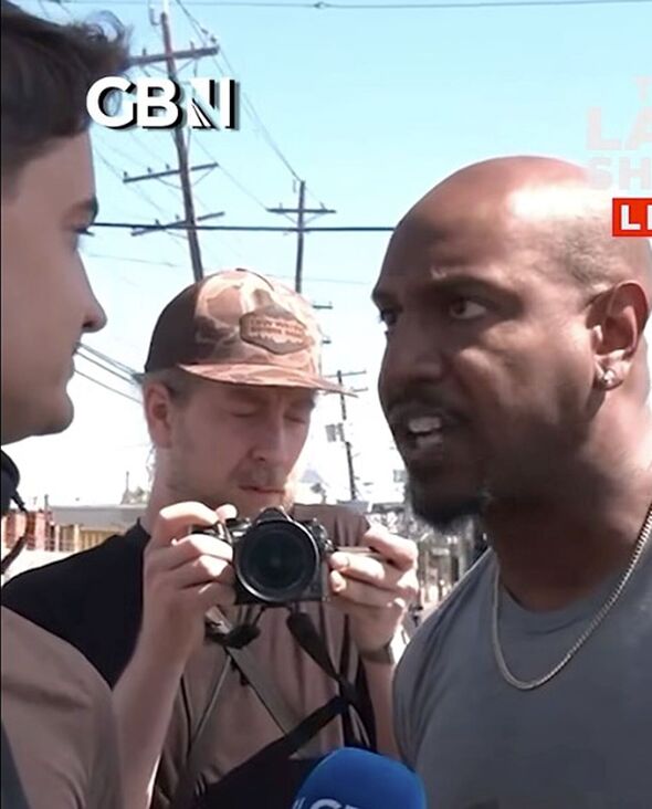 Watch: ‘I’m holding back from breaking your jaw’ protester erupts at GB News reporter