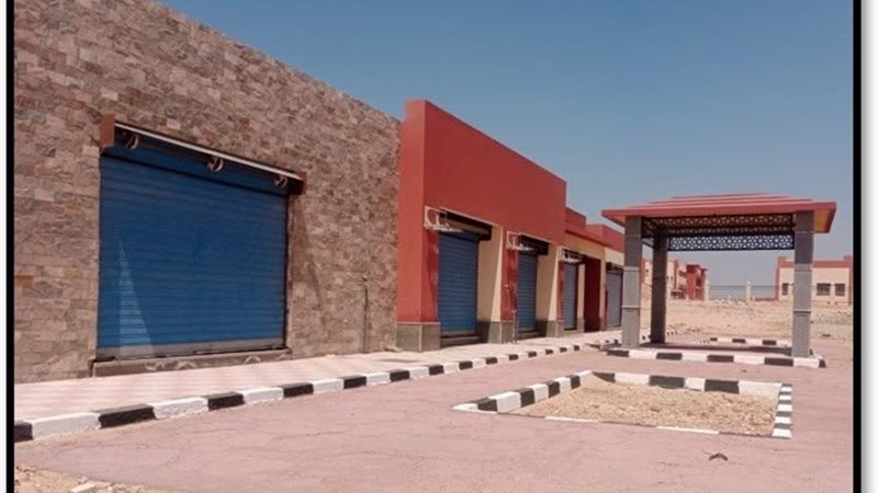 تسليم 266 قطعة أرض سكنية لمستحقيها وبيع 7 محال تجارية وصيدلية بملوي الجديدة