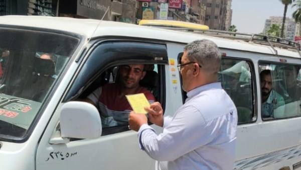 ضبط 401 مخالفة سرفيس وفض موقف عشوائى بميدان الجيزة وأخر بالمنيب