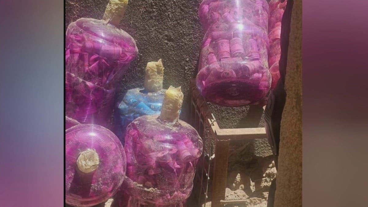 الأمن العراقي يضبط 11 قارورة مملوءة بالأموال بمنزل الجميلي