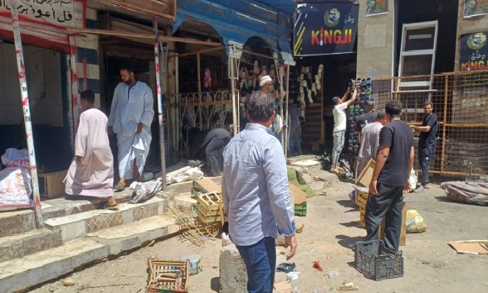 إزالة محال قديمة بموقف «هو» والألومنيوم في نجع حمادي ضمن خطة التطوير