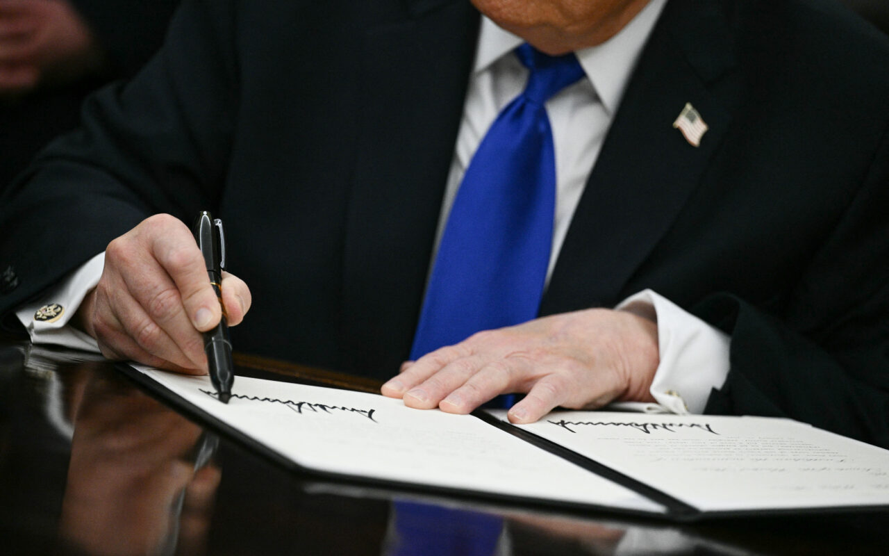 Trump signs downsized AI order