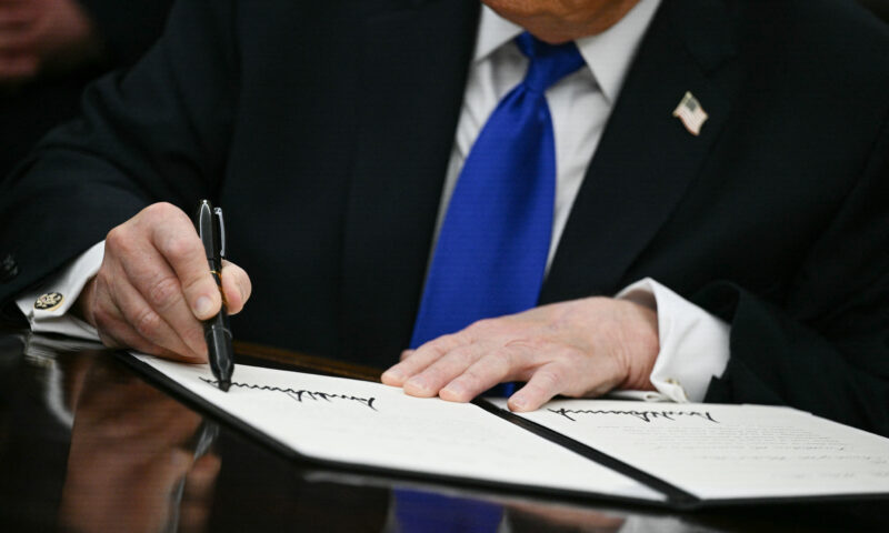 Trump signs downsized AI order