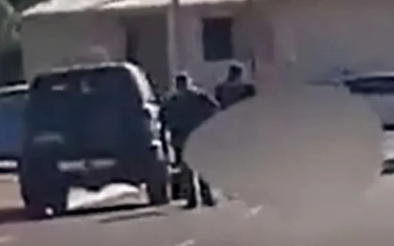 Shock moment police run down & shoot schoolgirl’s dog dead on the street as horrified neighbours scream ‘that was a pet’