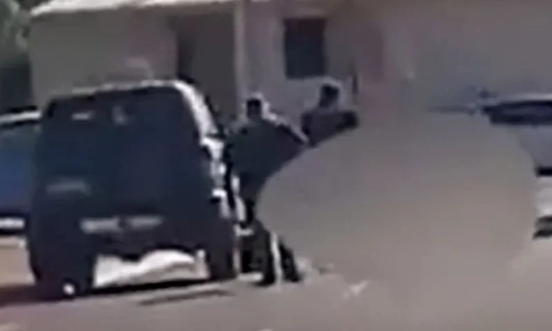Shock moment police run down & shoot schoolgirl’s dog dead on the street as horrified neighbours scream ‘that was a pet’
