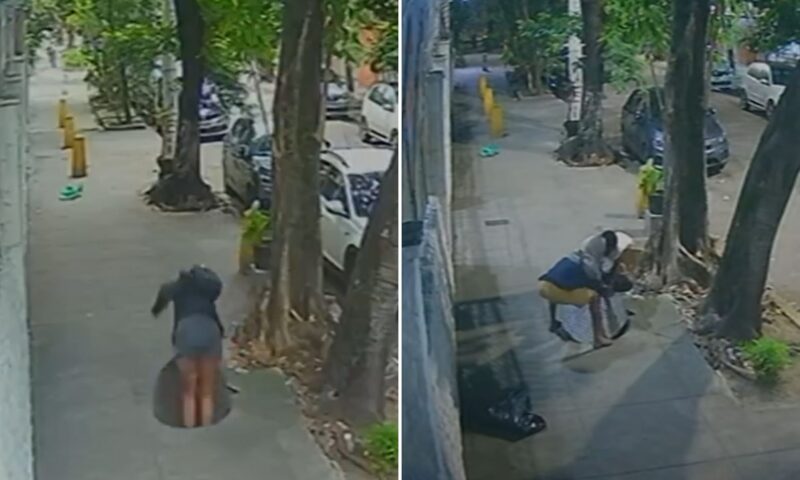 Moment woman, 31, falls down manhole on her way to work just hours after men had ‘tried to steal cover’