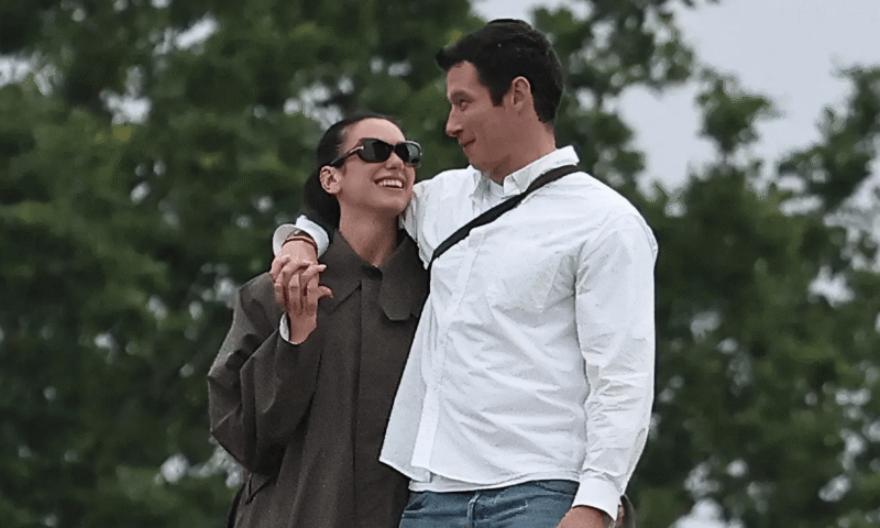 Dua Lipa and new husband Callum Turner look more in love than ever as they go on dog walk days after London wedding