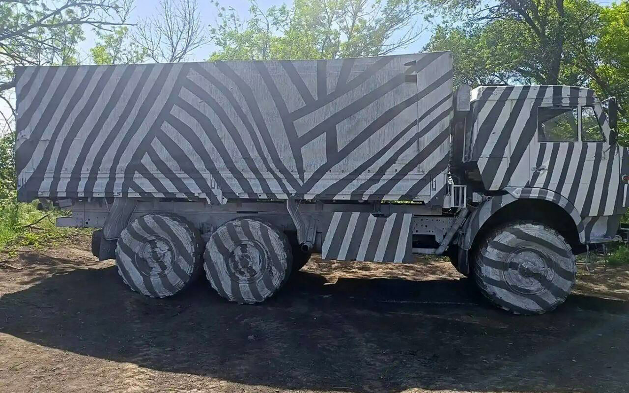 Desperate Putin paints military trucks in ZEBRA stripes in bid to dazzle Ukrainian AI drones wreaking havoc on Russians