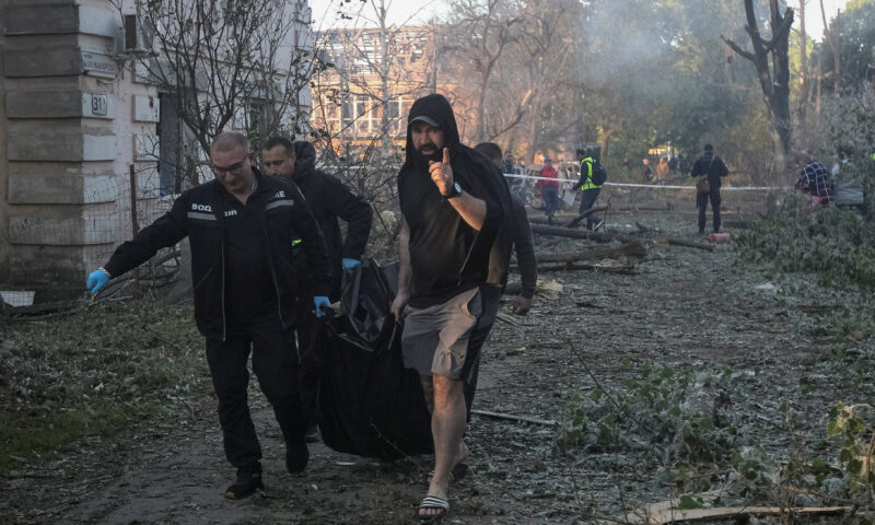 Russian attack on Ukraine kills at least 11 and traps others in damaged buildings