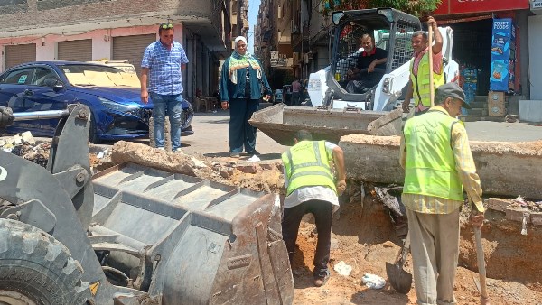 استجابة للشكاوى.. رفع تراكمات المخلفات من أسفل كوبري الدقي وميدان المساحة