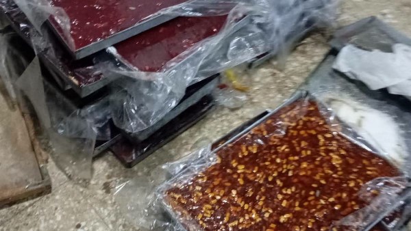 حملات بيئية على مصانع الحلويات الجافة بسنورس في الفيوم