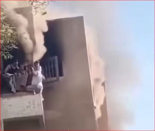 بين النار والموت.. أب يحاول إنقاذ أسرته من حريق أكتوبر وينتهي مصيره بسقوط مأساوي
